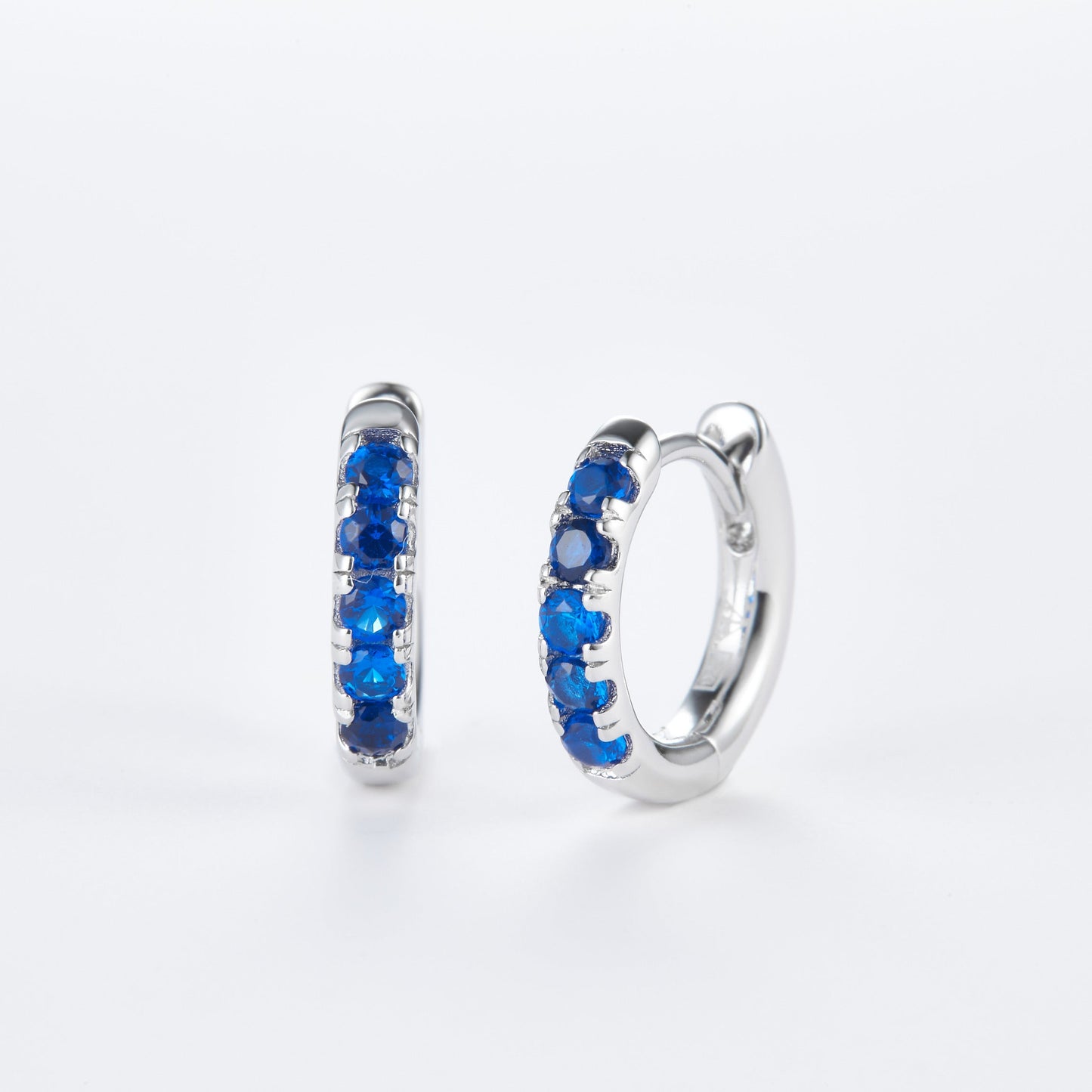 L-Eternità Blue Zirconia Small Huggies Earrings with White Rhodium