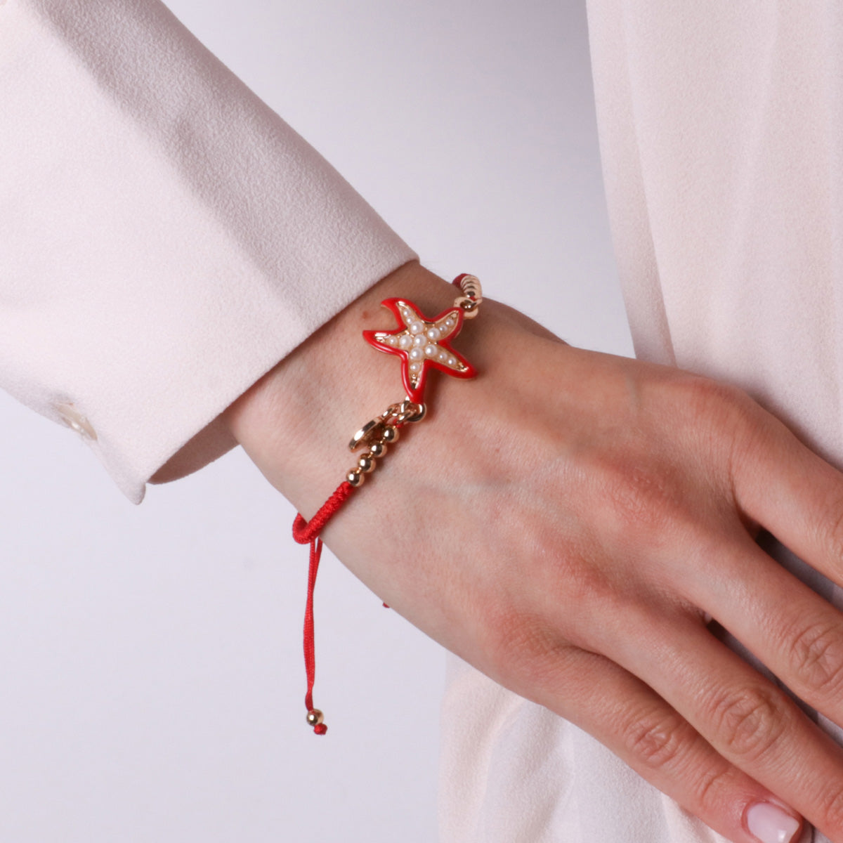 Bracelet with Red Cord and Starfish Spheres